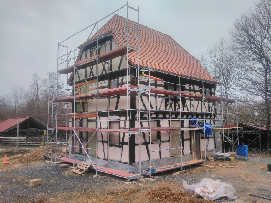 Verputztes Musterhaus